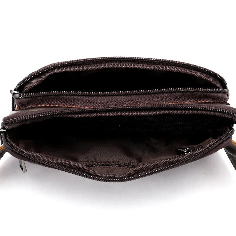 Horizontal square cowhide leather waist bag with zipper closure and multiple internal pockets