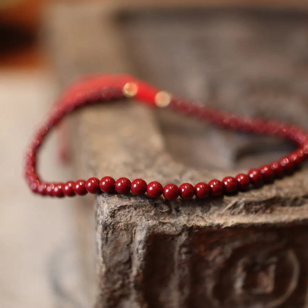 Handcrafted cinnabar bracelet with purple-gold sand geometric design, traditional Chinese style women's jewellery