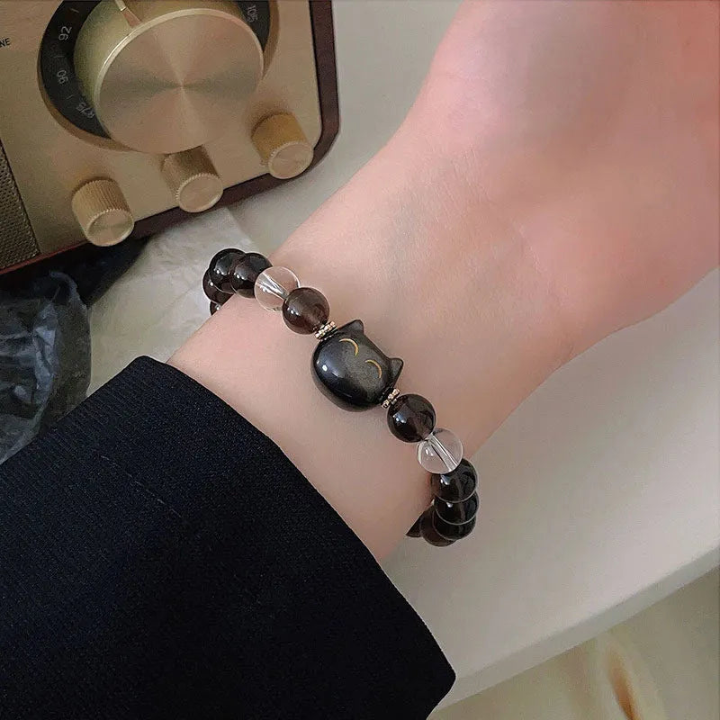 Women's silver stone cat head bracelet with 8mm ice stone beads and adjustable design