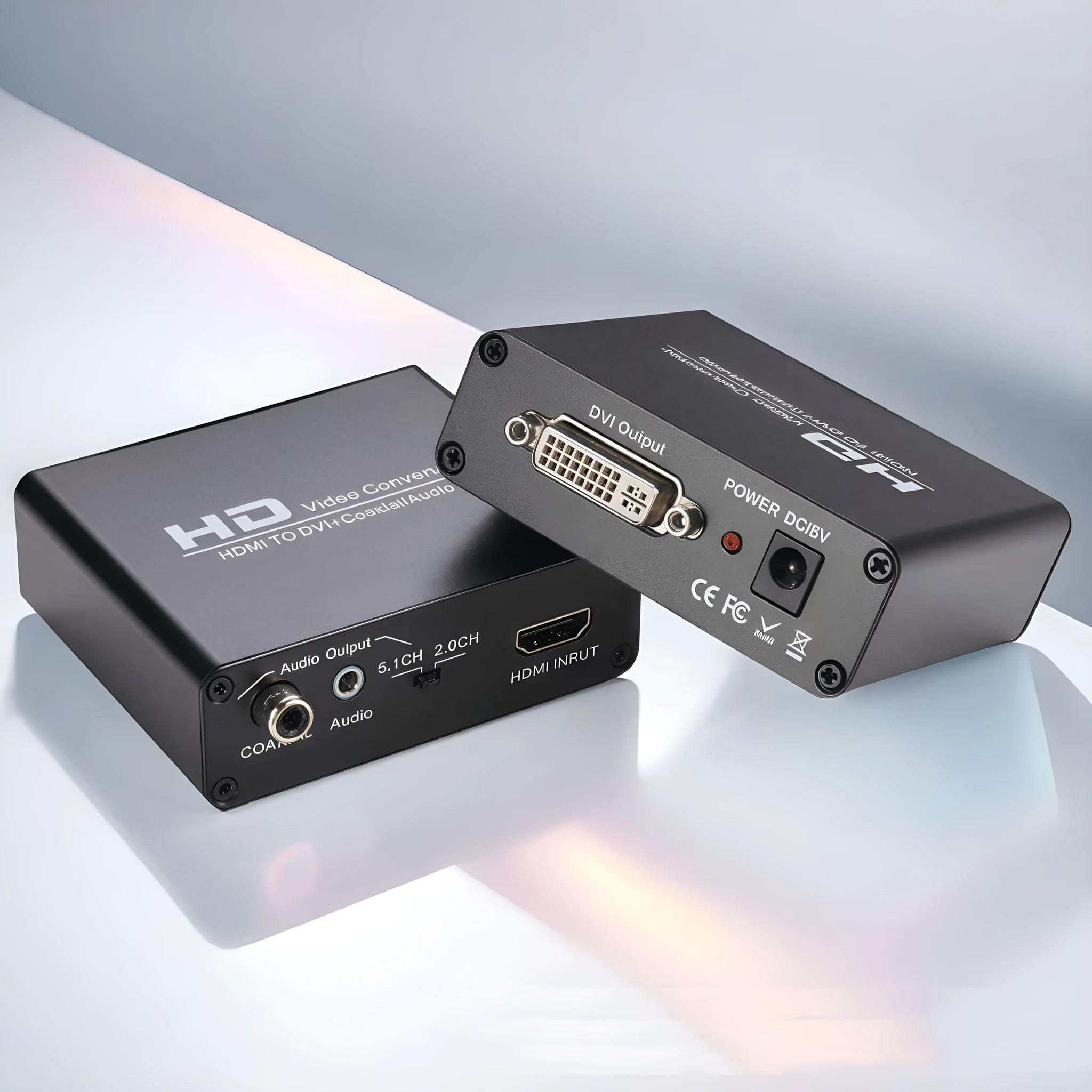 Black HDMI to DVI video converter unit with coaxial audio port, power supply, and a 1.5 metre cable.
