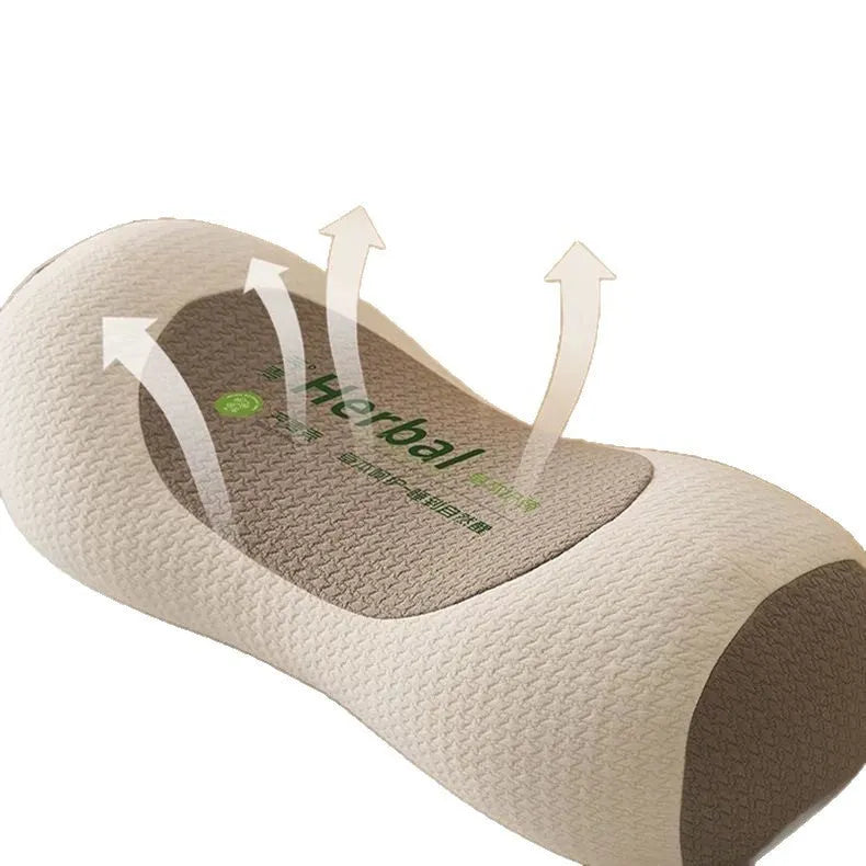 Buckwheat three-dimensional neck pillow in beige colour on a bed