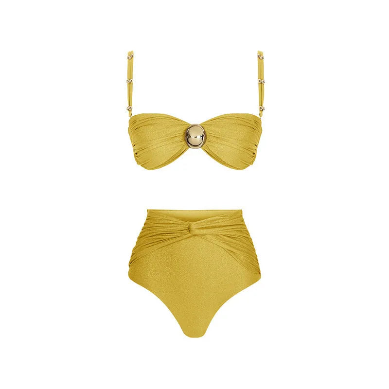 Women's yellow and green split bikini swimsuit set with high waist trousers and a wrap skirt laid flat.