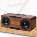 Wooden clock Bluetooth speaker with digital display in brown finish, showing clock face and speaker grille