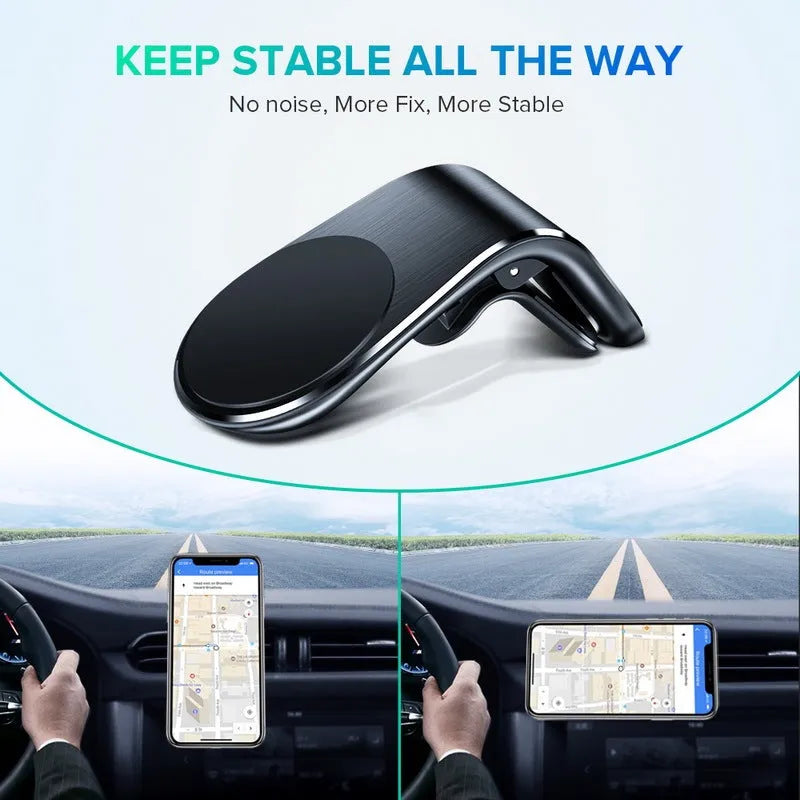 Black universal car phone holder bracket mounted on a car dashboard holding a smartphone.