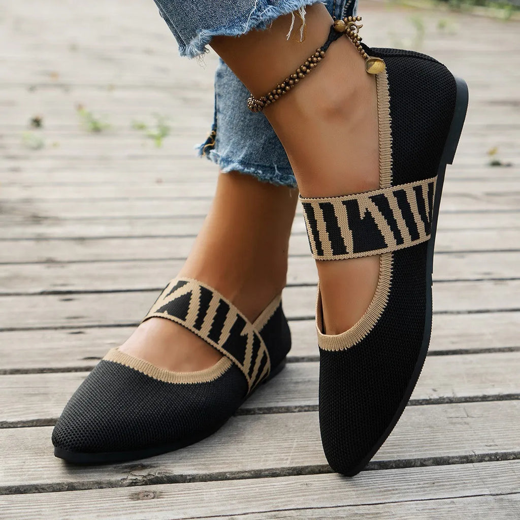 Women's pointed toe flat loafers in mesh upper with rubber sole, side view