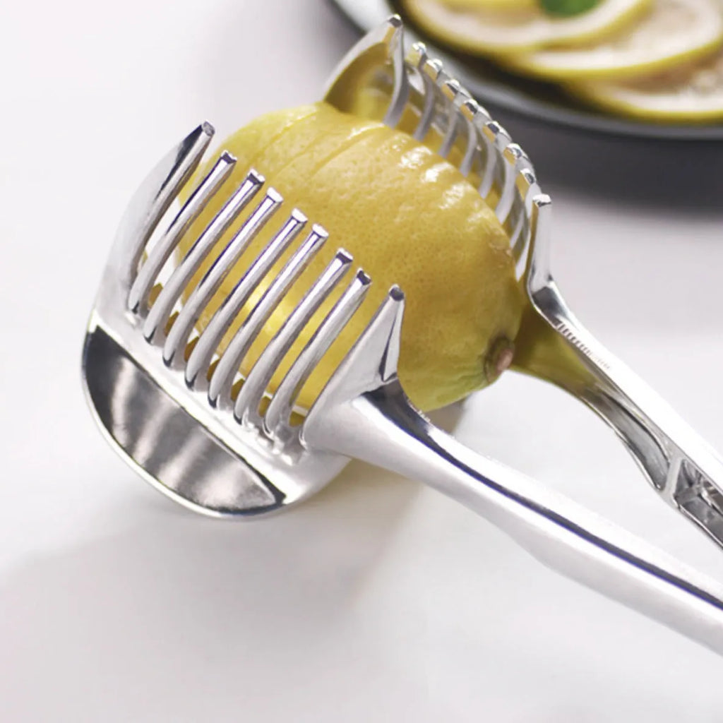 Silver plastic lemon slicer kitchen tool for cutting fruit and vegetables