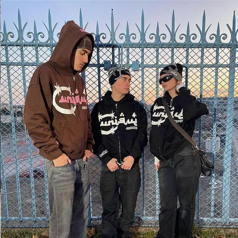 Letter print hooded zipper cardigan sweater in dark brown, full front view on a male model showing long sleeves and hood