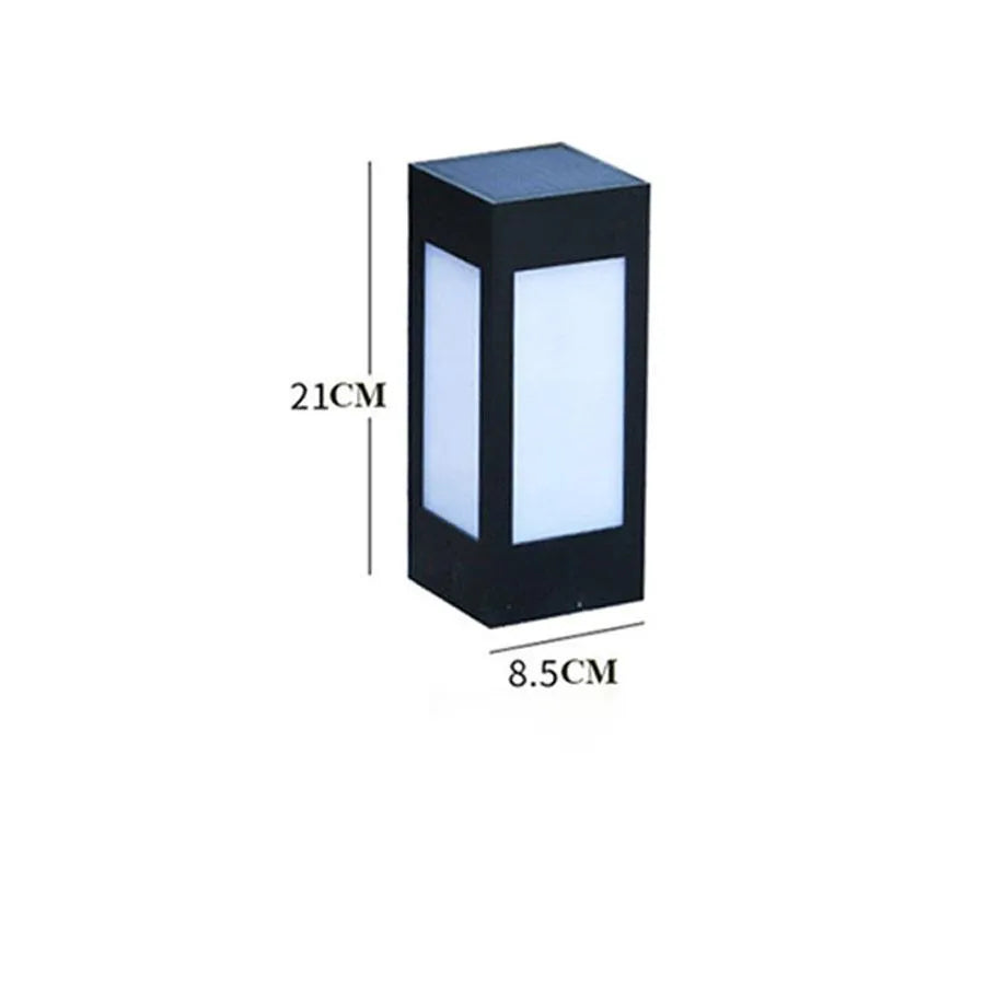 Set of solar-powered LED garden lights in different styles mounted on a garden wall and path