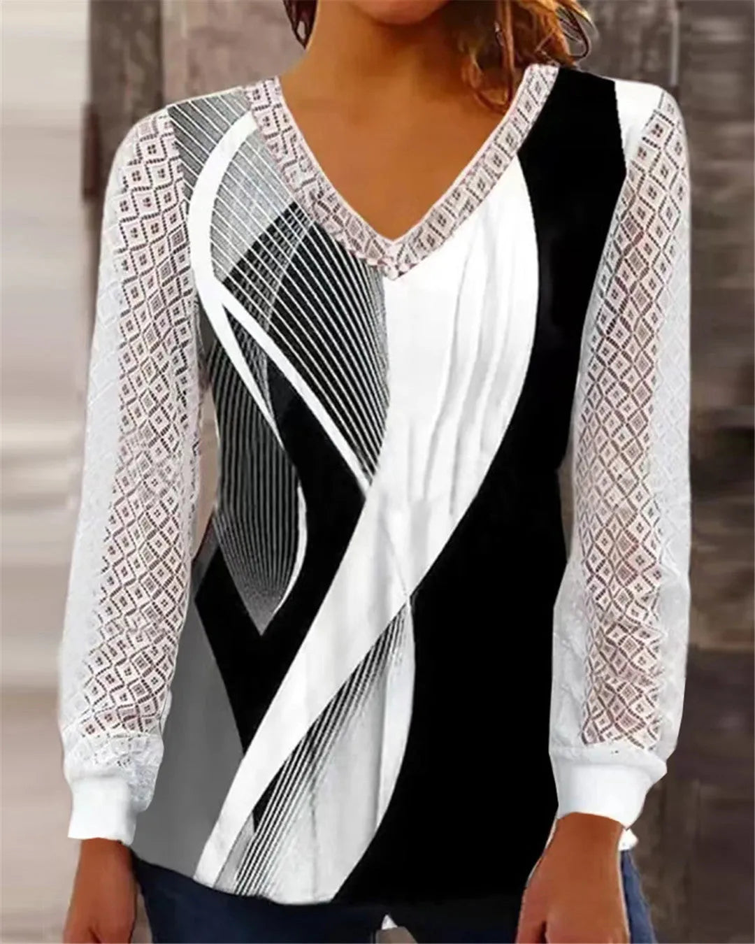 Purple loose fit V-neck women's top with long sleeves and a hollow-out lace print design.