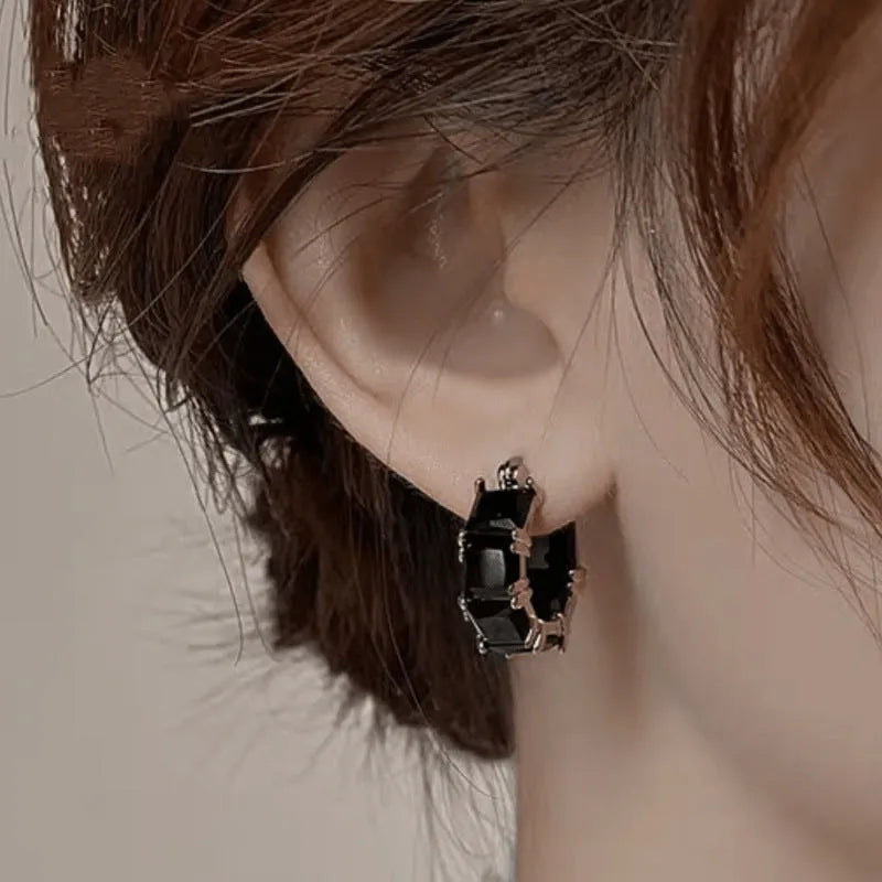 Women's geometric U-shaped earrings with crystal stones in gold electroplated copper