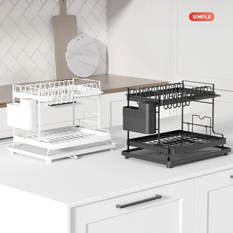 Modern white and black double-tier kitchen storage rack for draining utensils.