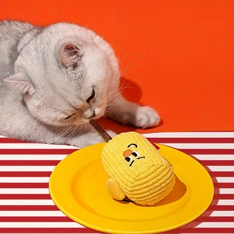 Natural corn cob and wood cat chew toy with catnip for dental hygiene, shown with dimensions 7cm by 6cm by 15cm.