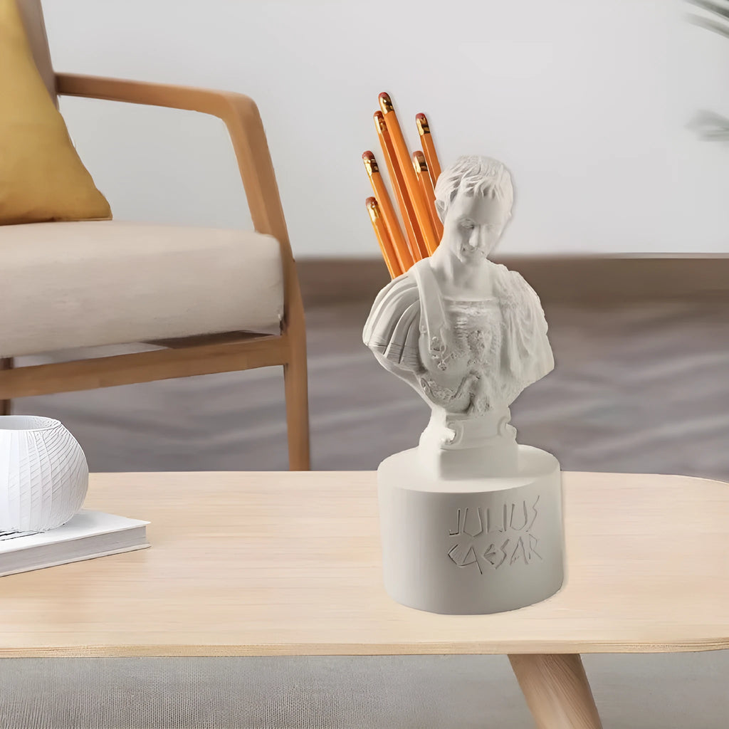 White synthetic resin American creative character pen holder on a desk