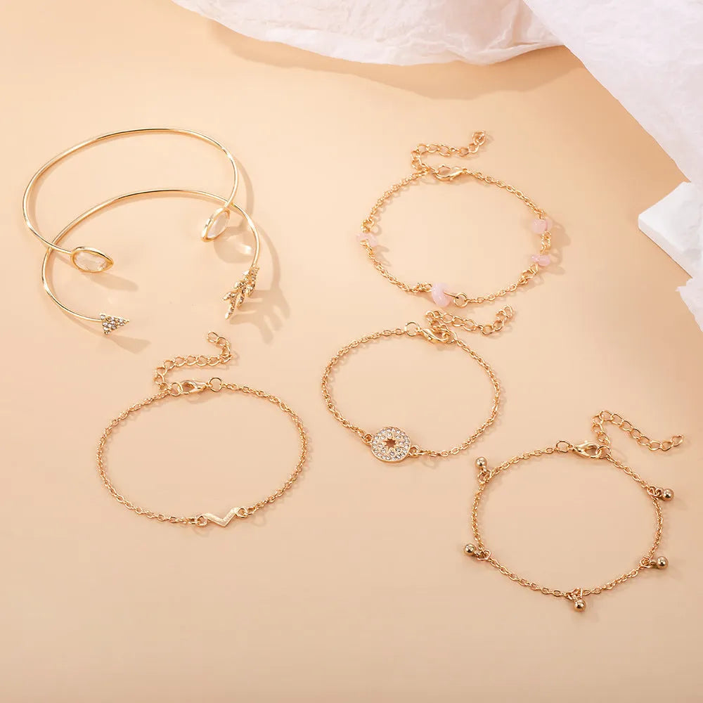 Six-piece women's bracelet set with golden spot drill arrow, water drop and V-shaped charms