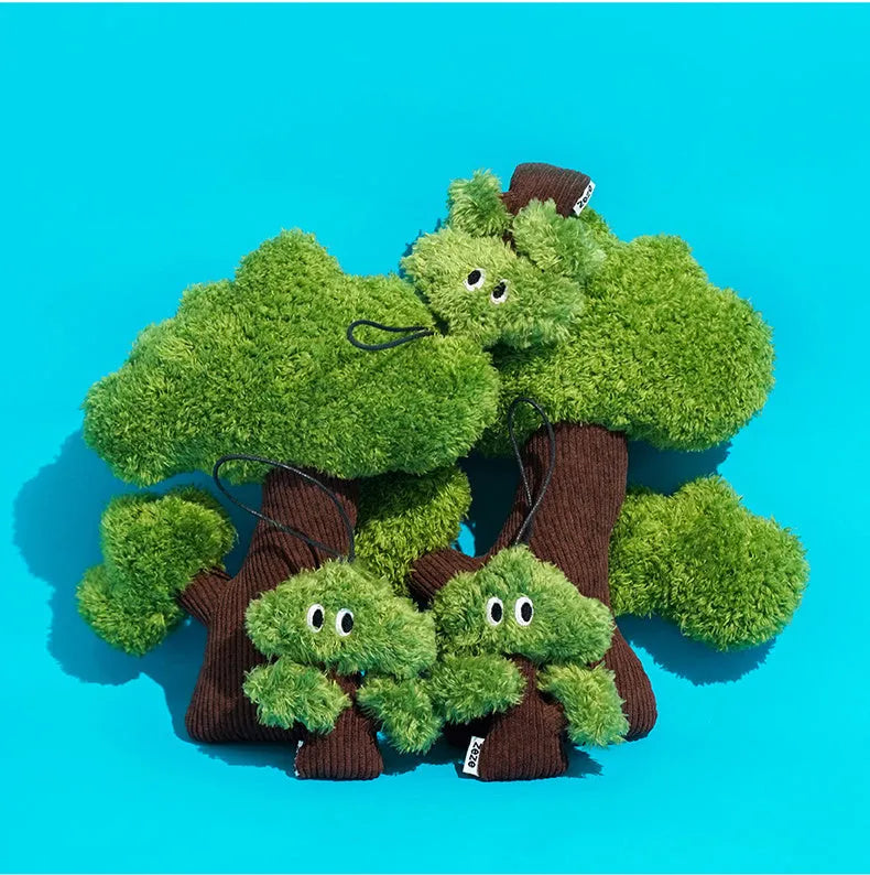Pine tree shaped fabric cat toy pendant with catnip, shown in three sizes.