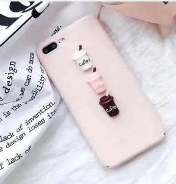 Soft silicone TPU iPhone case with a 3D cartoon cat design, shown in pink.