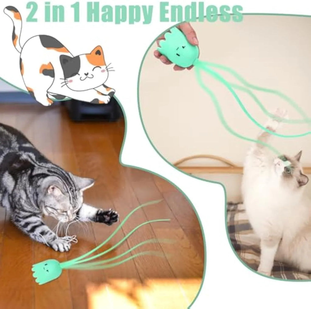 Green automatic cat wand toy with swinging silicone tails on a wooden floor.