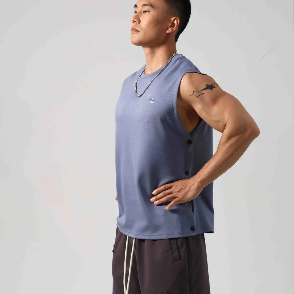 Male model wearing a solid colour loose fit cotton fitness vest with hidden side hooks.