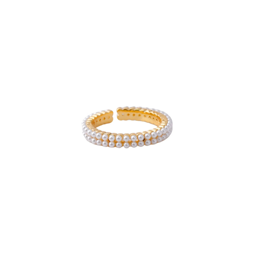 Gold electroplated open mouth pearl ring with geometry design on a copper base.