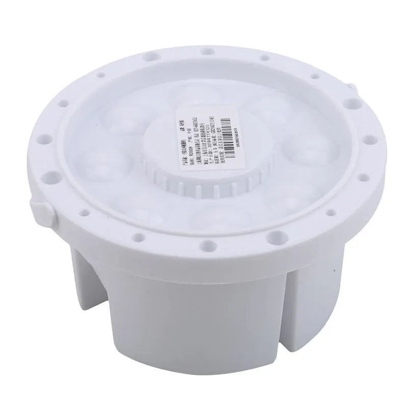 White plastic art brush holder with cake mould design measuring 16.5cm diameter