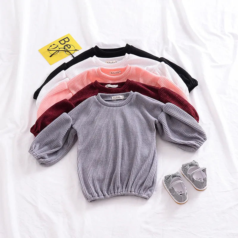 Girls solid colour cotton lantern sleeve t-shirt top in black, front view, for ages 3-8