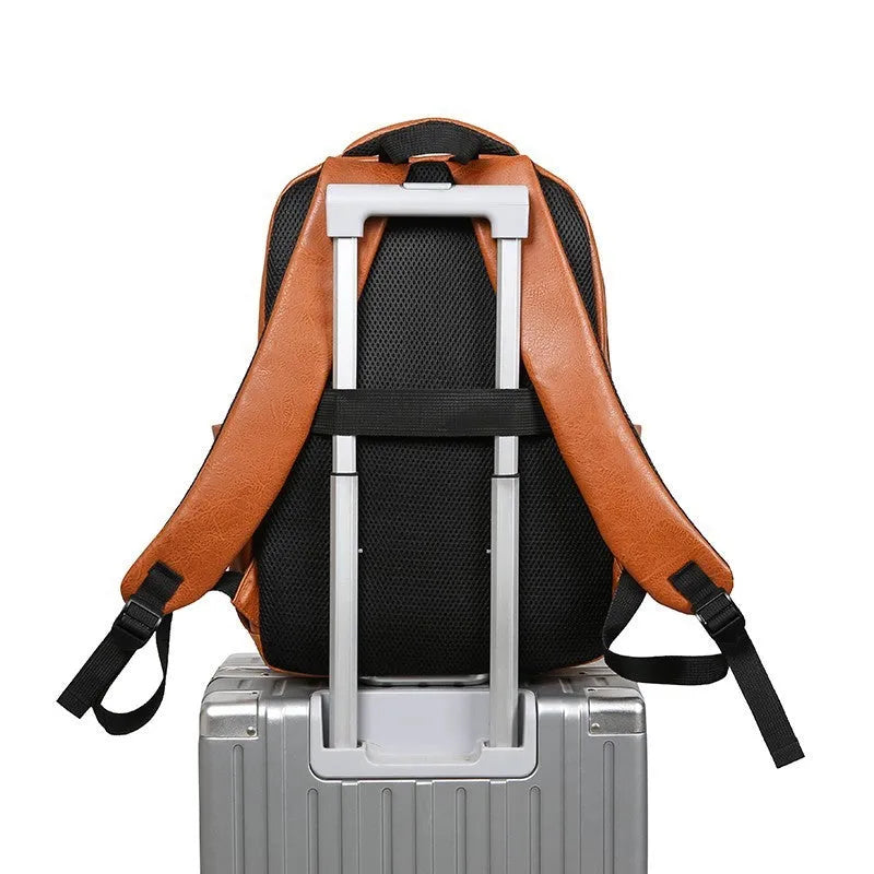 Men's large capacity PU backpack in khaki, 47x33x18cm, with curved shoulder straps and main compartment opening