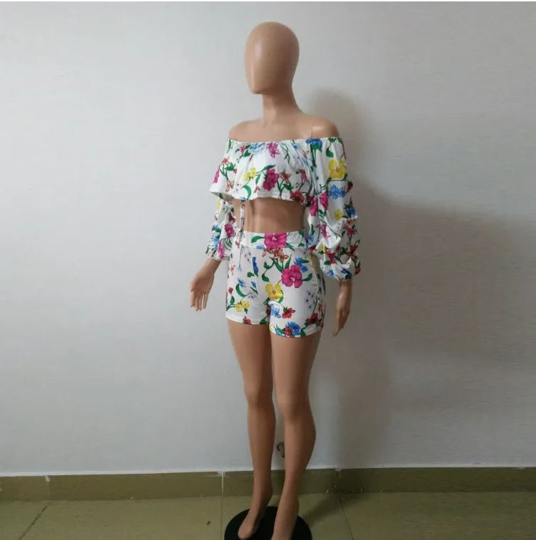 Women's multicolour digital print two-piece suit with a pile sleeve jacket and matching shorts.