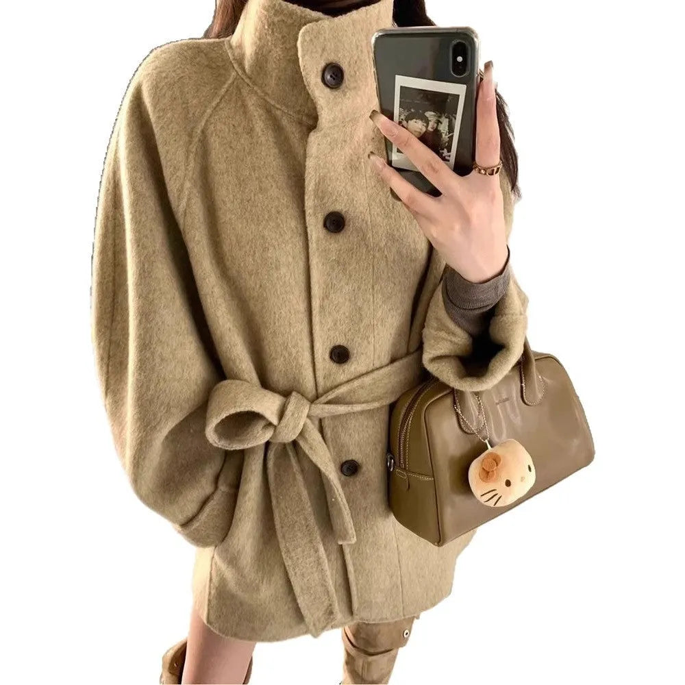 Korean style short woolen coat in black with button front, conventional sleeves, medium thickness, polyester fabric