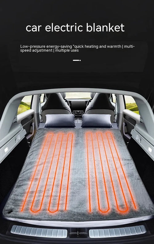 Grey 12v car electric blanket with power cord and controller on a car seat.