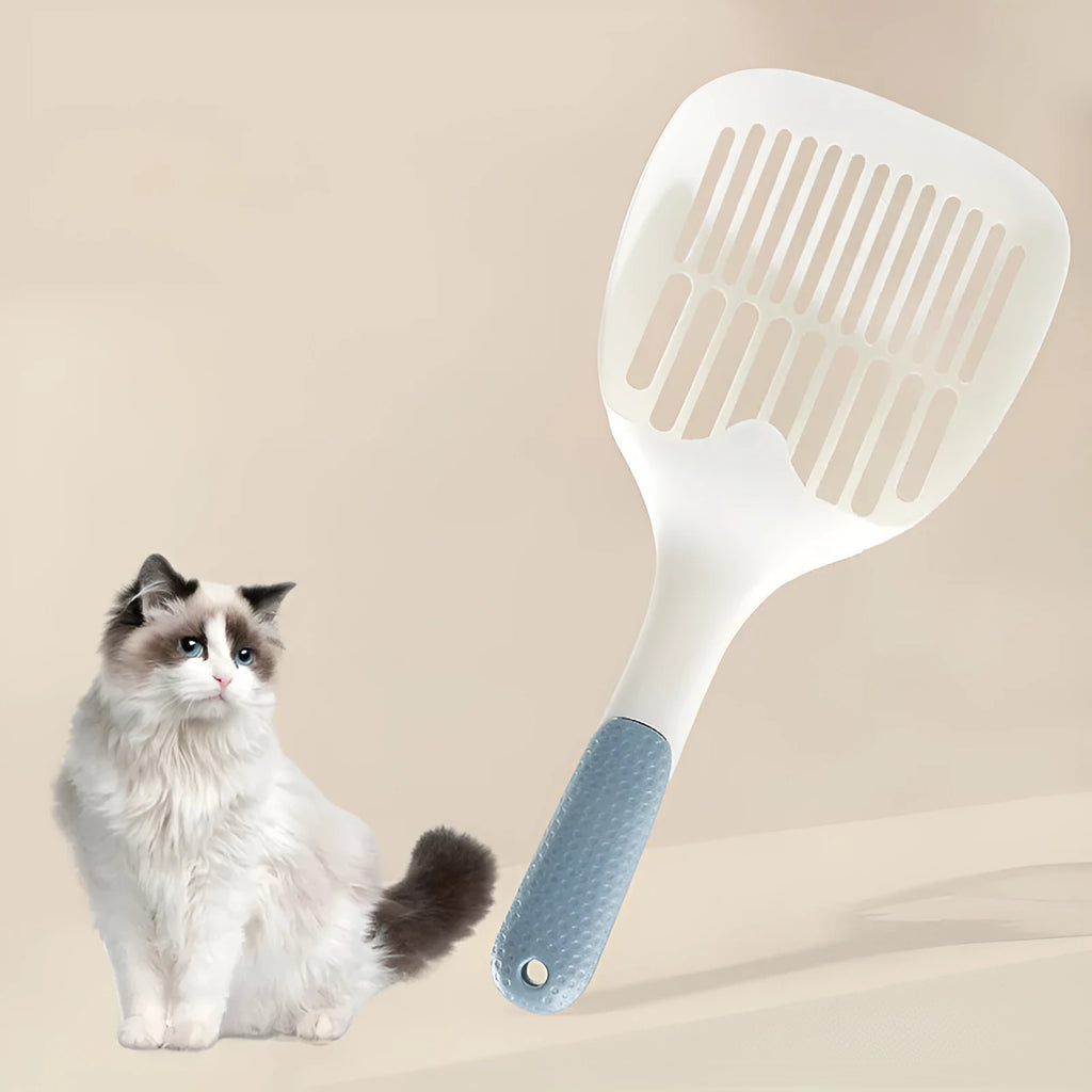 Large white plastic cat litter shovel for scooping clumping tofu cat litter.