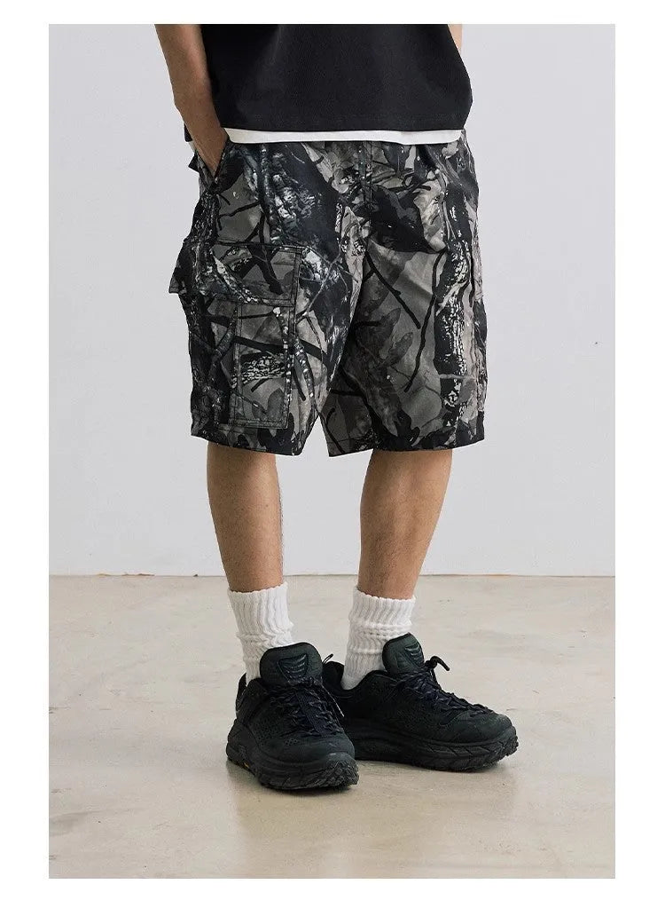 Men's loose fit denim shorts in army green with an elasticated waistband and straight leg.