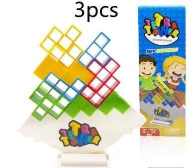 Plastic balance stacking board game with 16 coloured blocks, chassis, and base on a 26.5cm square box.