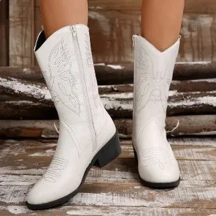 Women's black mid-calf Martin boots with chunky heel, pointed toe, and hollow out detailing