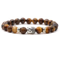 Natural stone stretch bracelet with Buddha head charm, 8mm beads, on wrist showing 19cm circumference