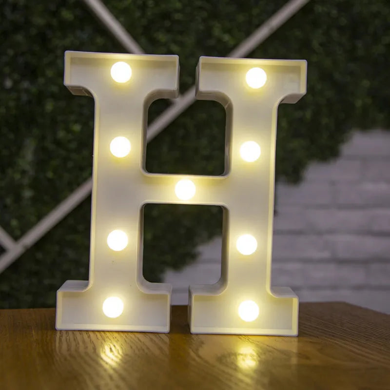 White plastic LED marquee letter sign with warm white glow, 22cm tall