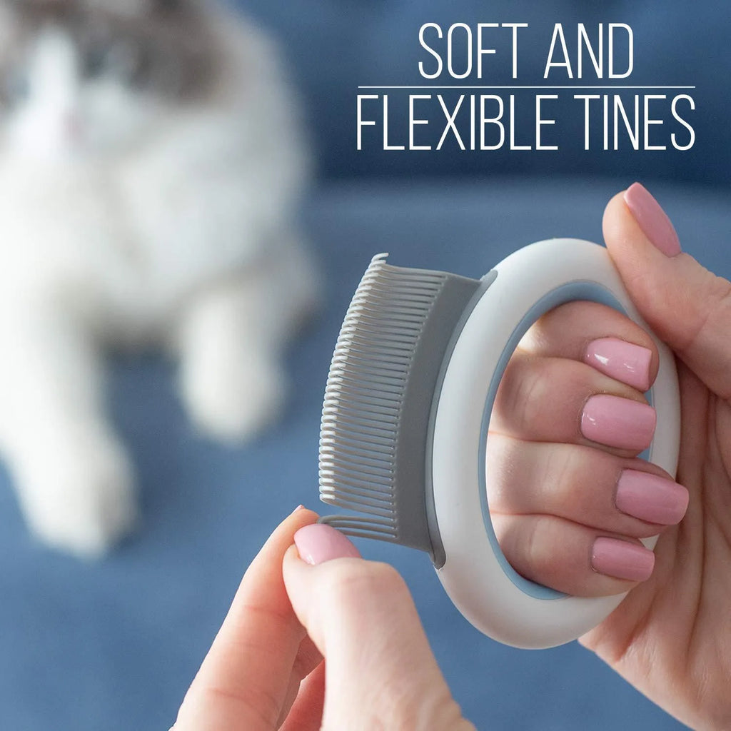 Blue pet deshedding comb with soft teeth and ergonomic plastic handle for cats and dogs.