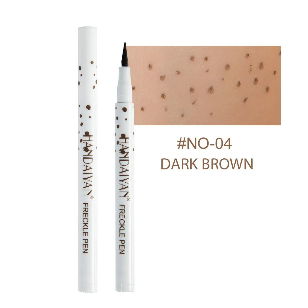 Dark brown freckle pen with precision tip for waterproof, natural-looking face and body makeup.