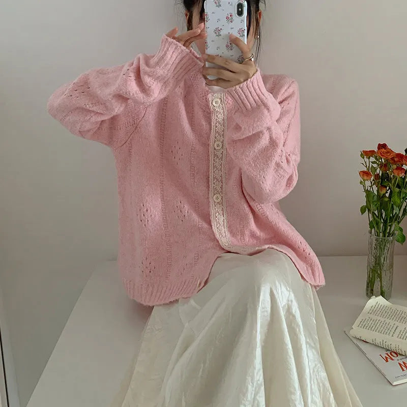 Artistic retro loose-fit sweater coat cardigan in apricot, shown on a model.