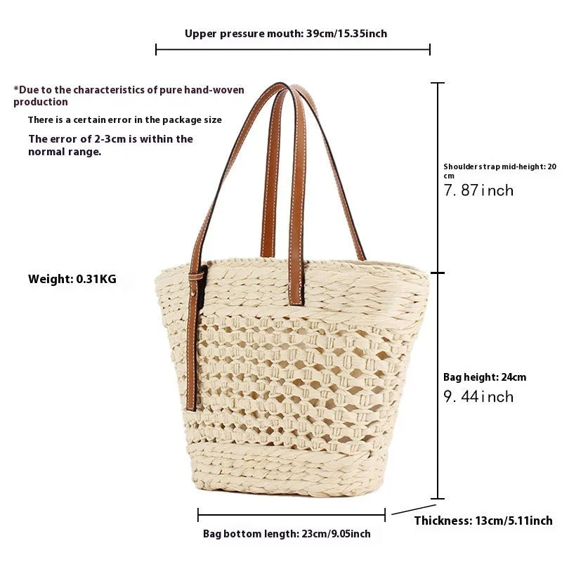 Paper woven shoulder bag with adjustable strap in beige colour showing horizontal square shape and straw decorative elements