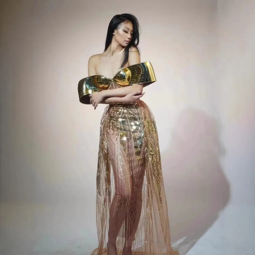 Gold strapless sequined dress with tulle skirt split, showing front and back views