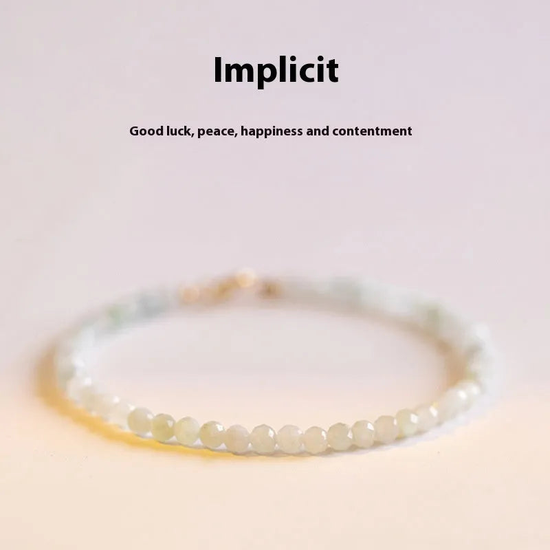 Women's Korean style retro jade ball bracelet on a wrist, showing the bead detail and chain clasp.