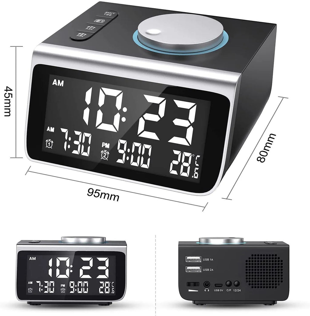 FM radio alarm clock with USB charging port and 3-inch digital display on a bedside table