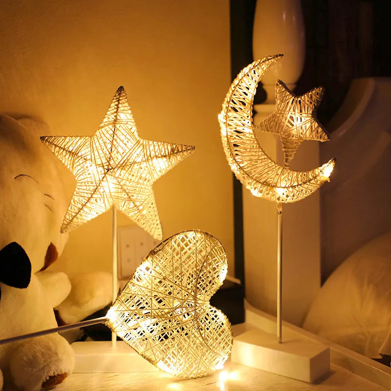 Rattan and copper wire LED table lamp in star, heart, or moon shape for bedroom decoration.