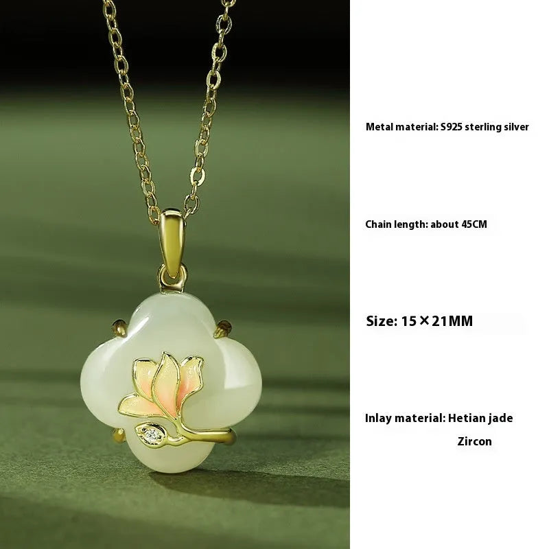 S925 sterling silver magnolia necklace, bracelet, and ear studs set with inlaid Hetian jade in a New Chinese floral style.