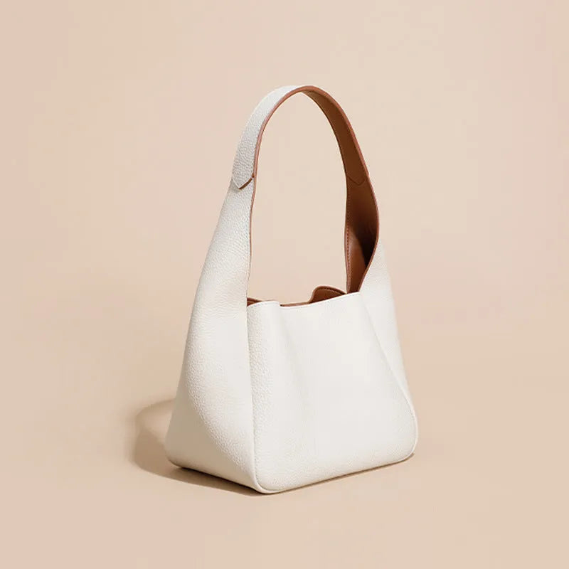 Top layer cowhide genuine leather women's shoulder bag in camel colour, horizontal square shape with sewing thread detail