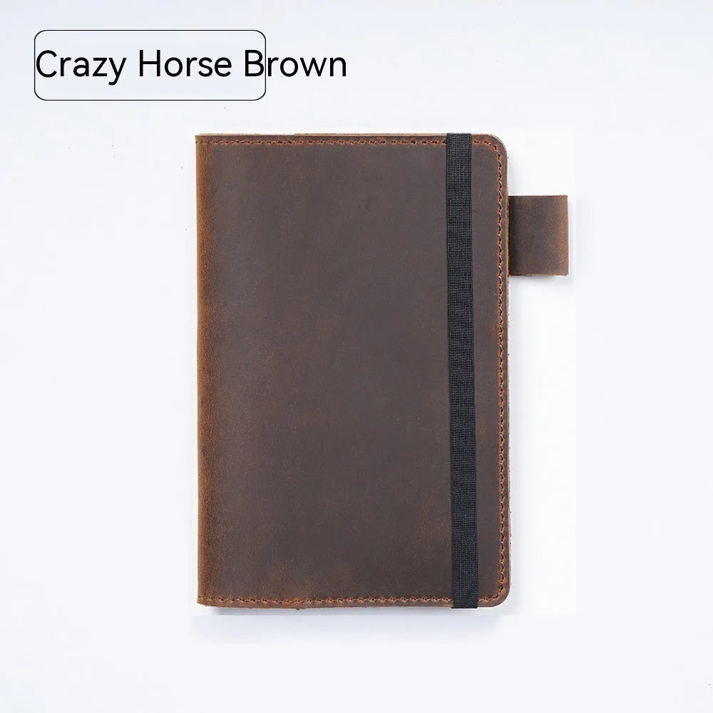 Handmade kraft notebook with cowhide cover showing dark green colour and 9x14cm wood-free paper pages