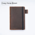Handmade kraft notebook with cowhide cover showing dark green colour and 9x14cm wood-free paper pages