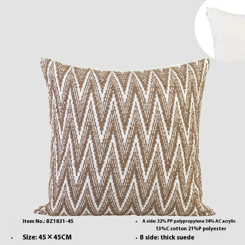 Chinese style square cushion in brown Maillard colour on a sofa.