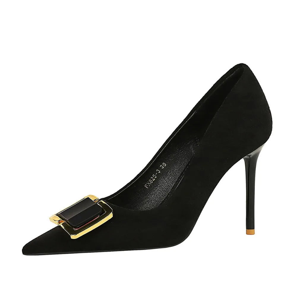 Black suede women's high heel court shoes with a 9cm stiletto heel and pointed toe on a rubber sole.