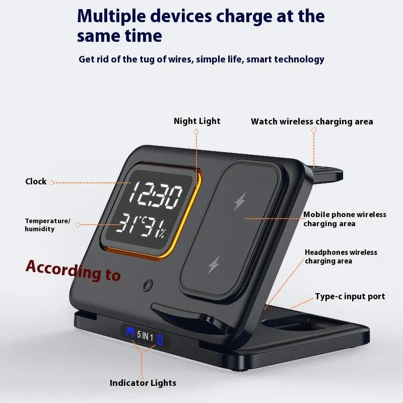 Black and white wireless charging dock station with digital clock display charging a phone, watch and headphones